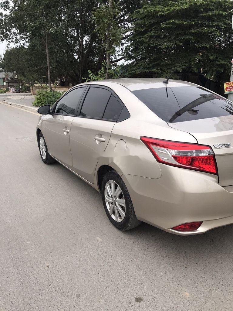 Toyota Vios 2017 - Bán Toyota Vios E MT sản xuất 2017, màu vàng cát số sàn