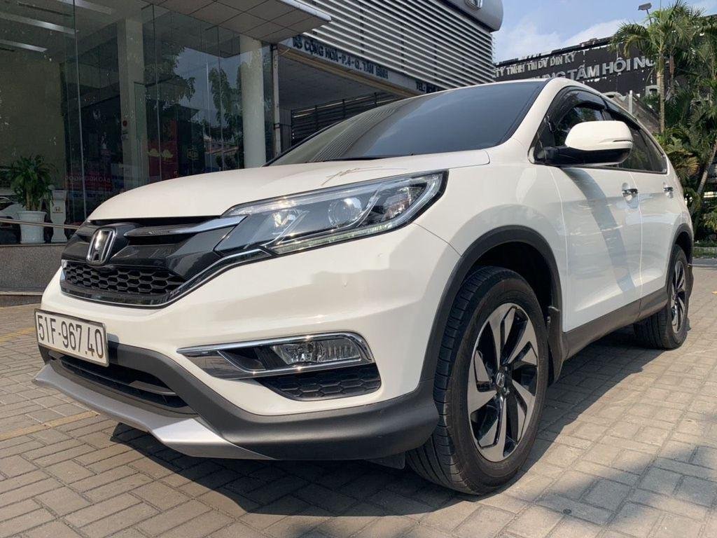 Honda CR V   2016 - Cần bán gấp Honda CR V đời 2016, màu trắng như mới, giá tốt