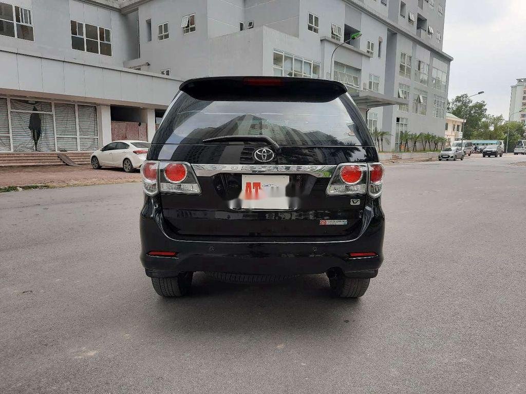 Toyota Fortuner 2015 - Cần bán lại xe Toyota Fortuner 2015, màu đen, 665 triệu