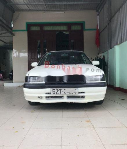 Mazda 323   1995 - Bán ô tô Mazda 323 1995, màu trắng, xe gia đình