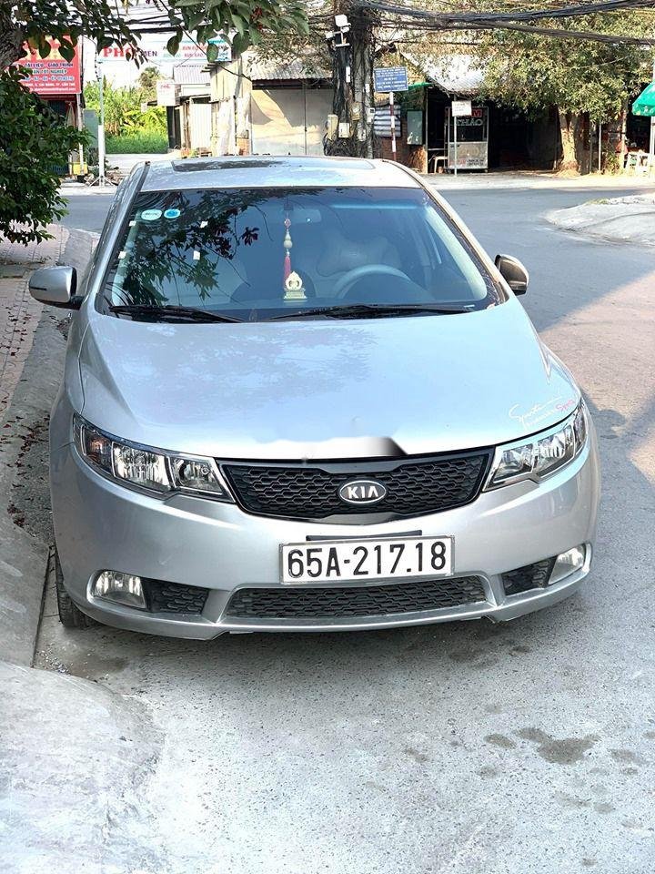 Kia Forte 2010 - Bán ô tô Kia Forte đời 2010, màu bạc