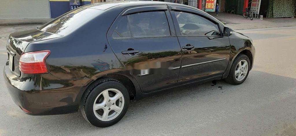 Toyota Vios 2009 - Cần bán xe Toyota Vios năm 2009, màu đen xe gia đình