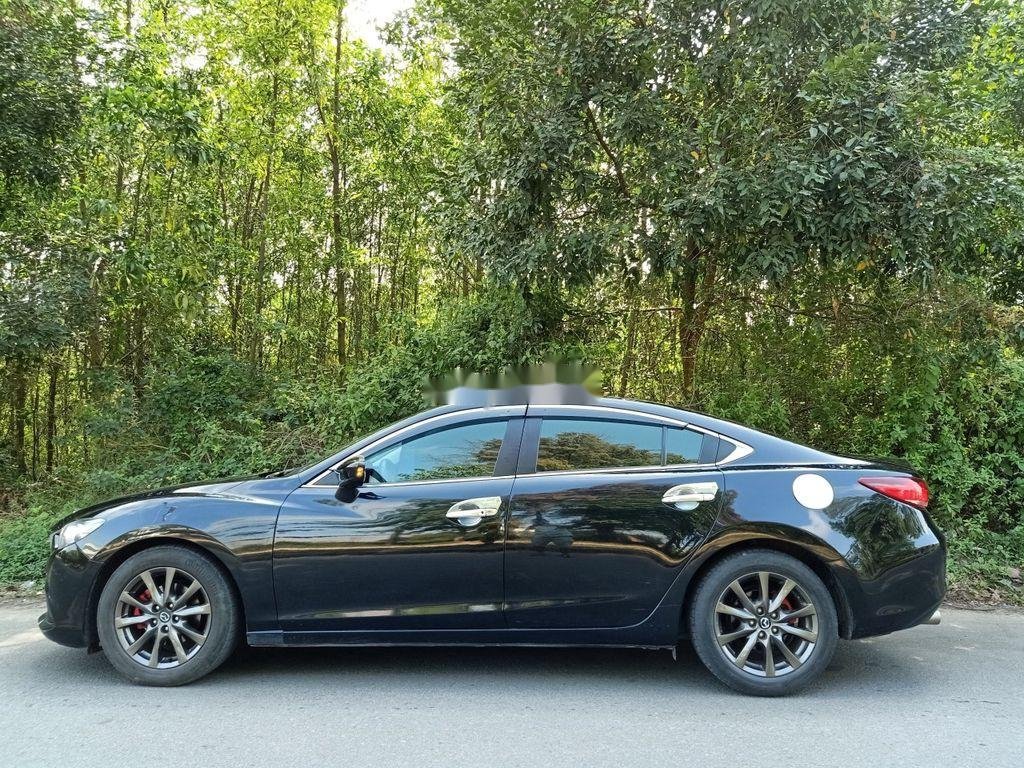 Mazda 6 2015 - Cần bán lại xe Mazda 6 sản xuất 2015, màu đen, xe nhập, giá chỉ 585 triệu