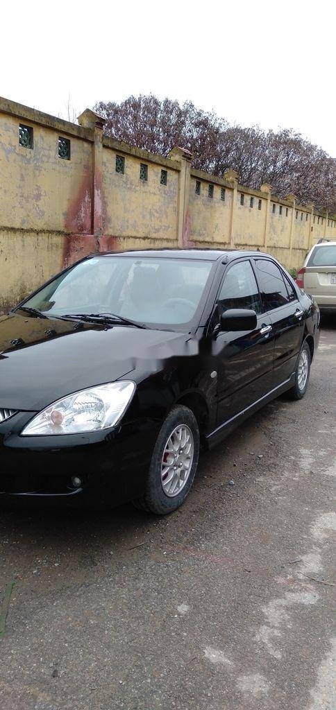 Mitsubishi Lancer 2003 - Bán Mitsubishi Lancer 1.6AT năm sản xuất 2003, màu đen chính chủ, giá tốt