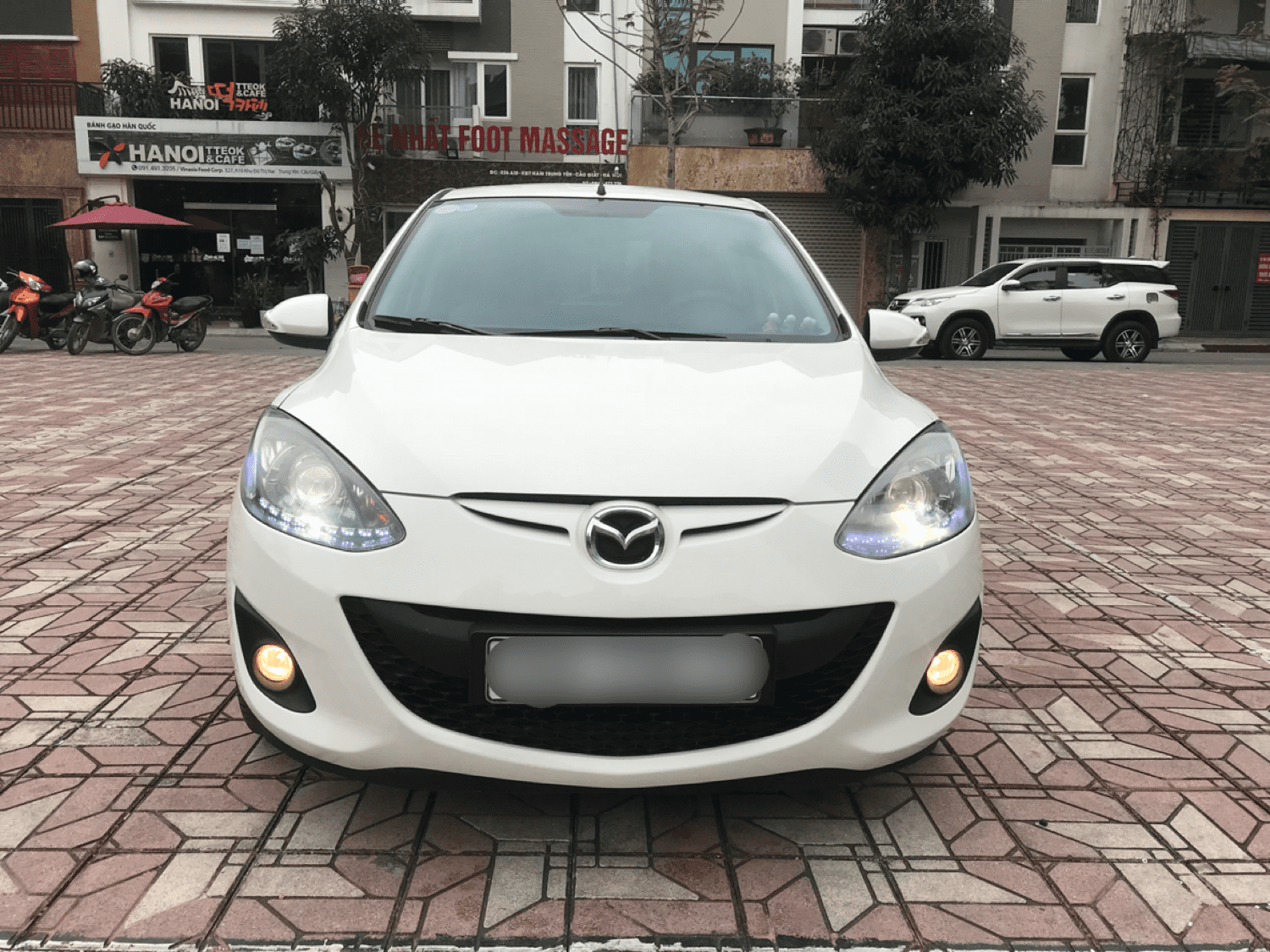 Mazda 2 2014 - Hỗ trợ trả góp ngân hàng với chiếc Mazda 2 S, đời 2014, màu trắng, giao nhanh