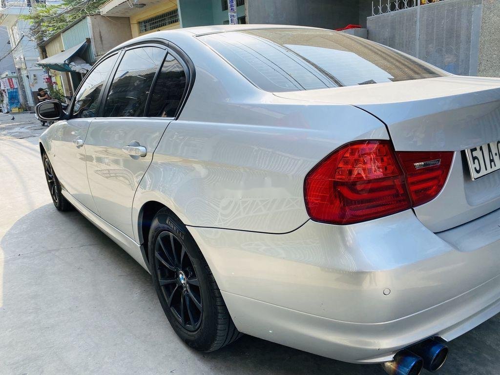 BMW 3 Series   2010 - Bán ô tô BMW 320i đời 2010, màu bạc, nhập khẩu