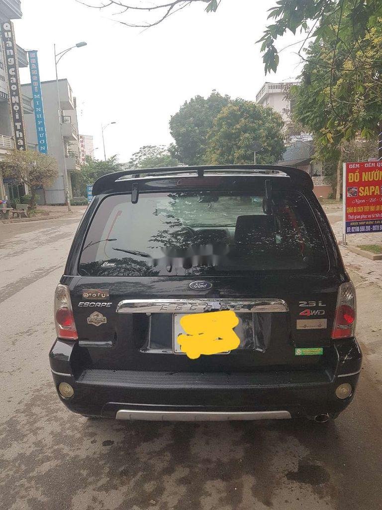 Ford Escape   2005 - Cần bán gấp xe cũ Ford Escape 2.3 sản xuất năm 2005, màu đen, số tự động