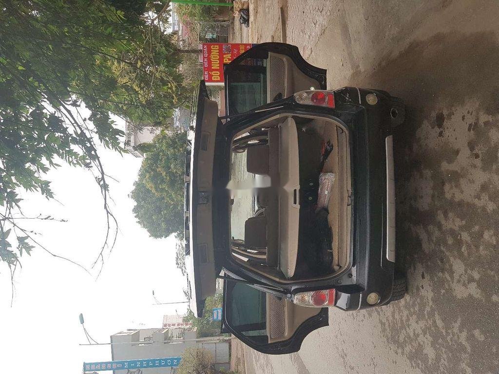 Ford Escape   2005 - Cần bán gấp xe cũ Ford Escape 2.3 sản xuất năm 2005, màu đen, số tự động