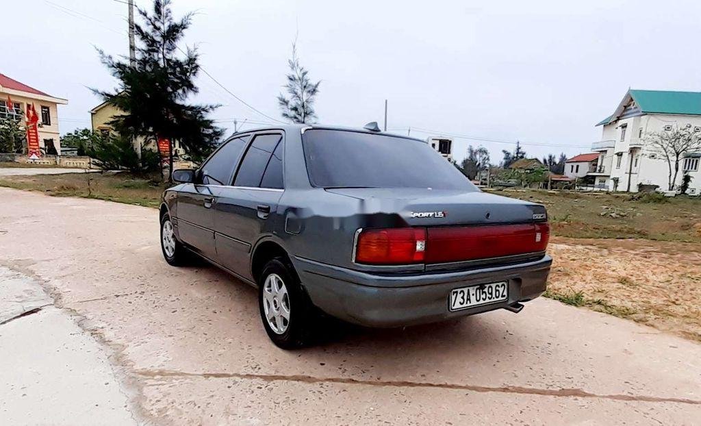 Mazda 323 1996 - Bán Mazda 323 sản xuất năm 1996, màu xám, nhập khẩu, giá tốt