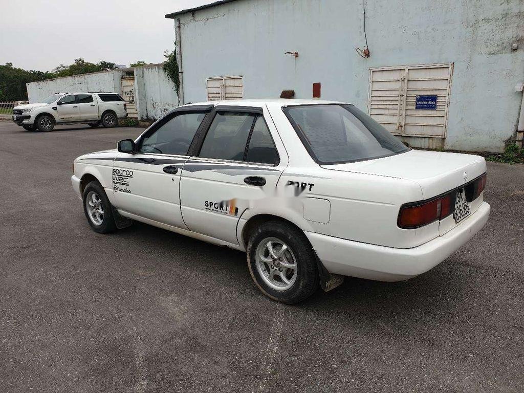 Nissan Sunny   1990 - Bán Nissan Sunny sản xuất 1990, màu trắng, nhập khẩu, số sàn, giá tốt