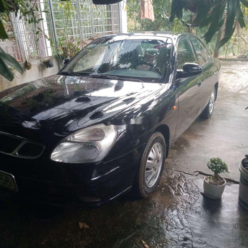 Daewoo Nubira  1.6MT  2002 - Bán Daewoo Nubira 1.6MT năm sản xuất 2002, màu đen, nhập khẩu nguyên chiếc, giá chỉ 60 triệu