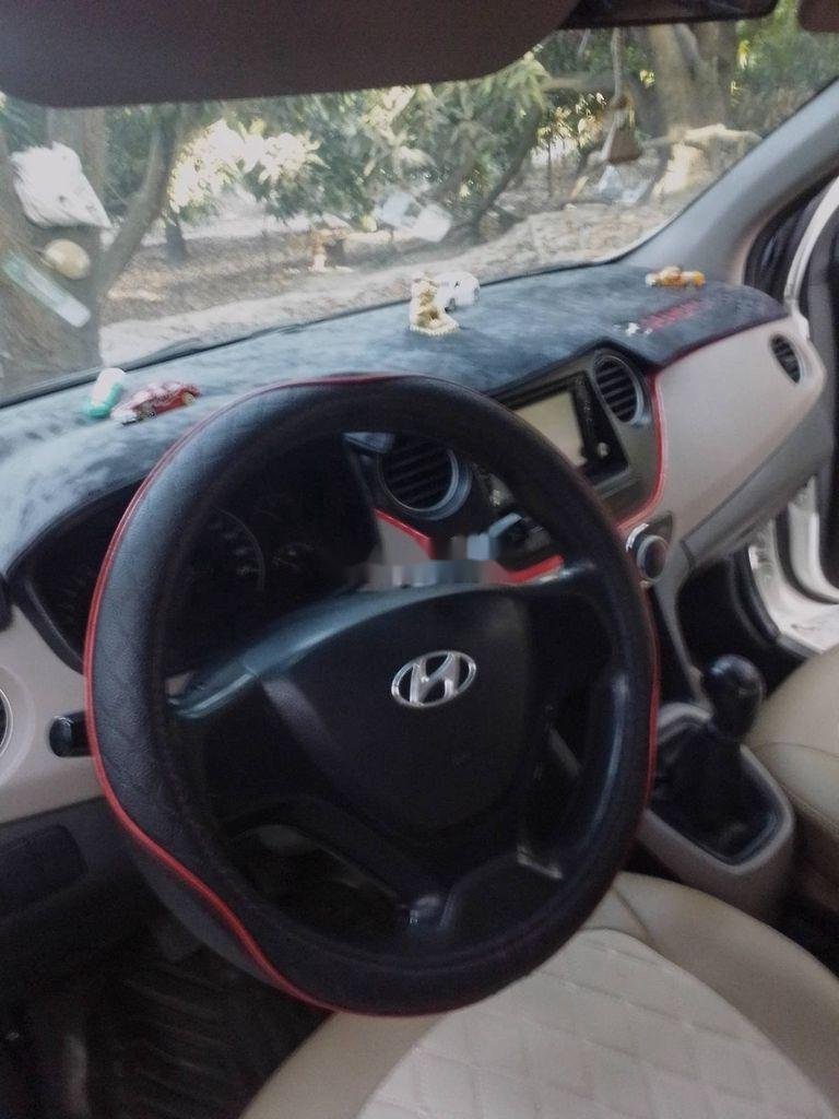 Hyundai Grand i10 MT 2014 - Bán ô tô Hyundai Grand i10 MT đời 2014, màu trắng, nhập khẩu xe gia đình