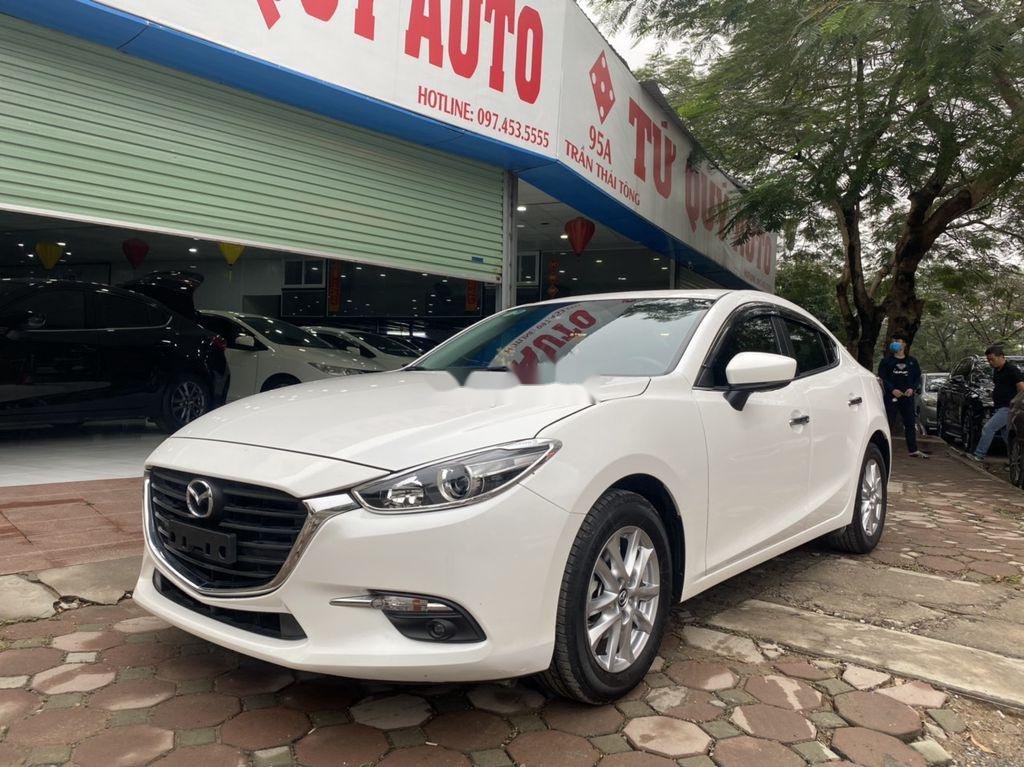Mazda 3   2018 - Cần bán lại xe Mazda 3 đời 2018, màu trắng, giá 630tr