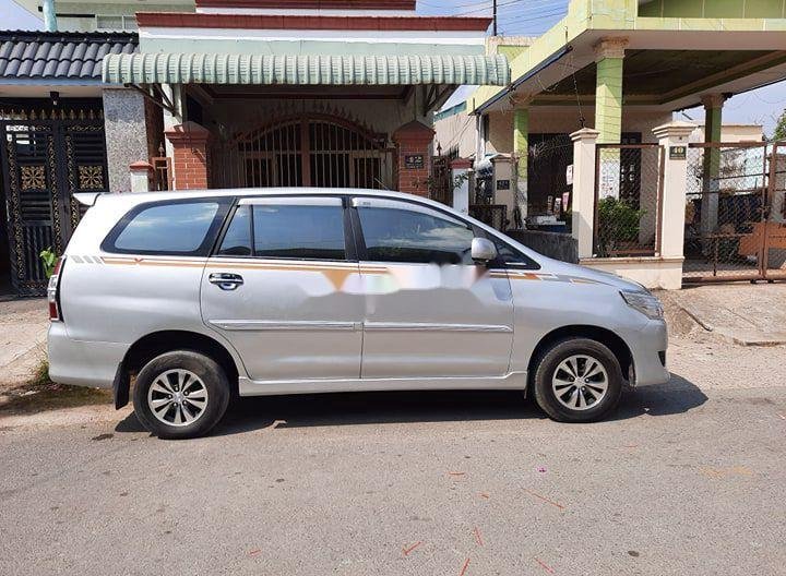 Toyota Innova 2013 - Cần bán xe Toyota Innova E đời 2013, màu bạc còn mới