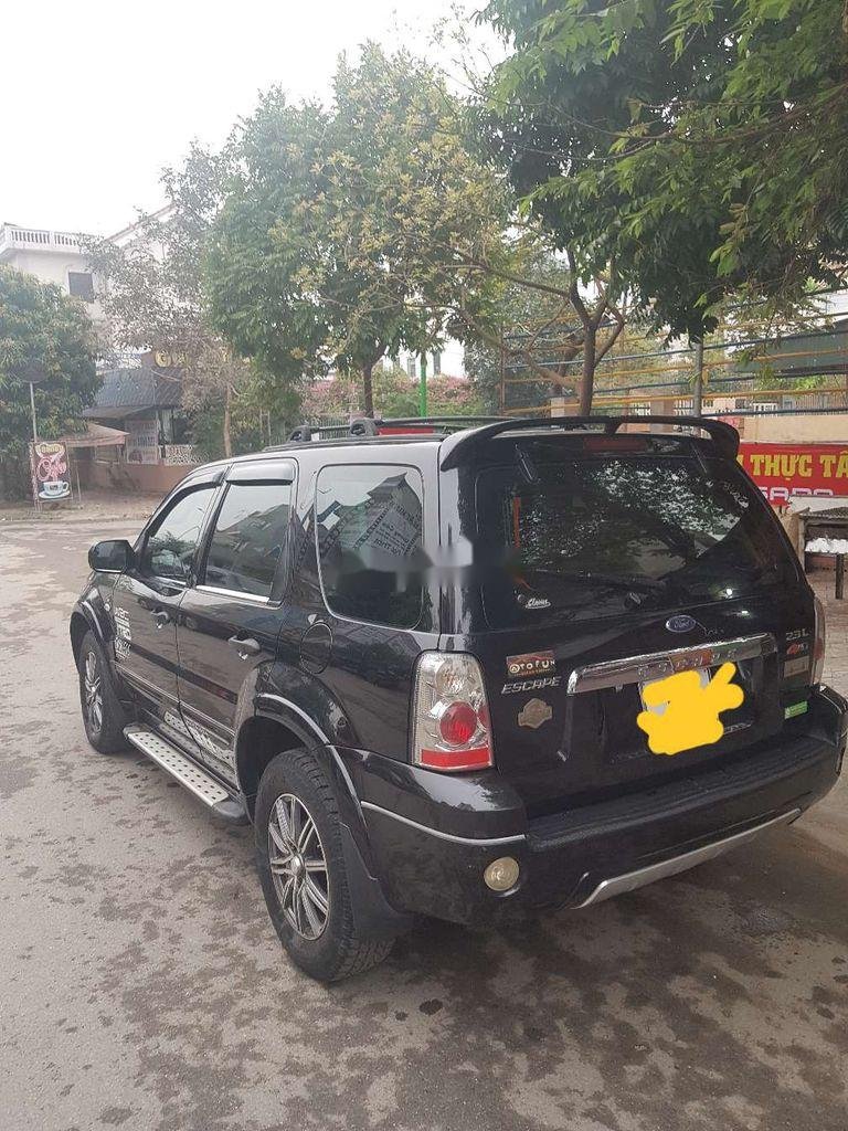 Ford Escape   2005 - Cần bán gấp xe cũ Ford Escape 2.3 sản xuất năm 2005, màu đen, số tự động