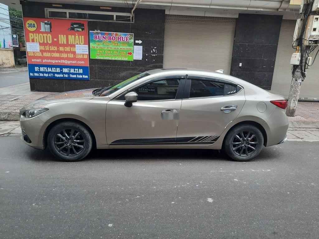 Mazda 3   2015 - Bán Mazda 3 đời 2015, màu vàng, số tự động