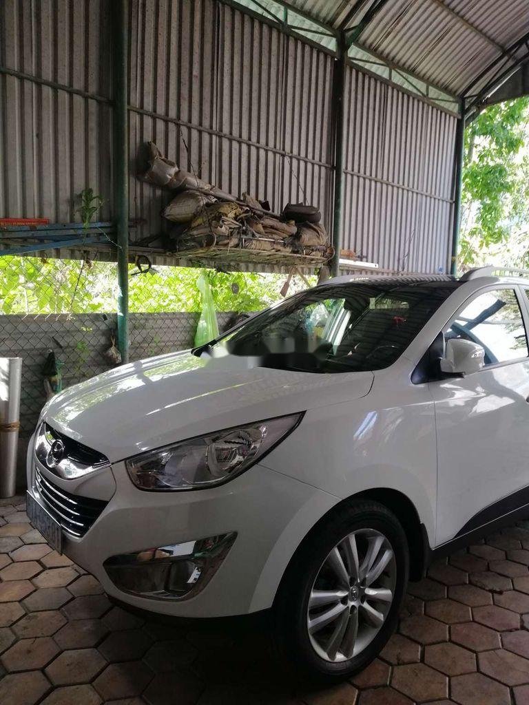 Hyundai Tucson   2011 - Bán ô tô Hyundai Tucson đời 2011, màu trắng, xe nhập