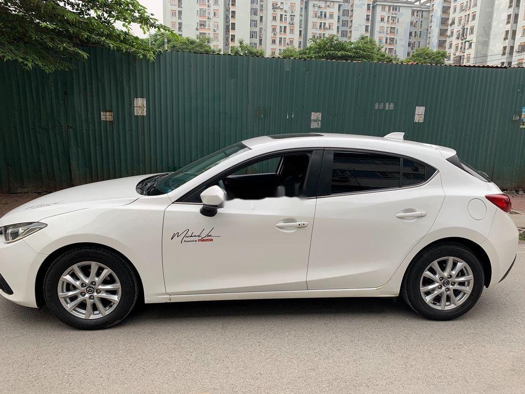 Mazda 3   2015 - Cần bán xe Mazda 3 đời 2015, màu trắng, nhập khẩu, giá tốt