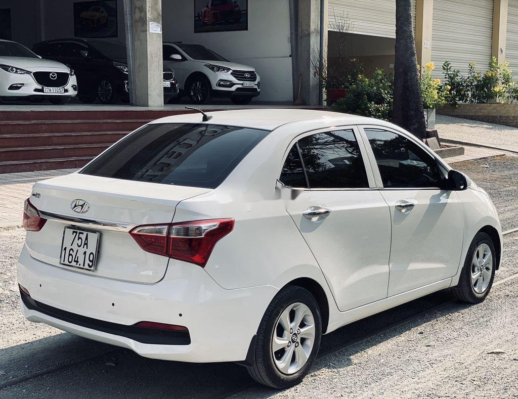 Hyundai Grand i10 2019 - Cần bán gấp Hyundai Grand i10 đời 2019, màu trắng đẹp như mới