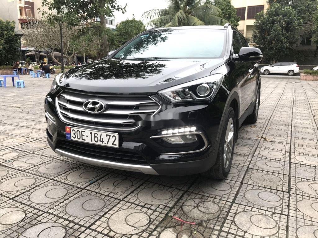 Hyundai Santa Fe 2016 - Cần bán Hyundai Santa Fe 2.2 sản xuất 2016, màu đen, giá 868tr