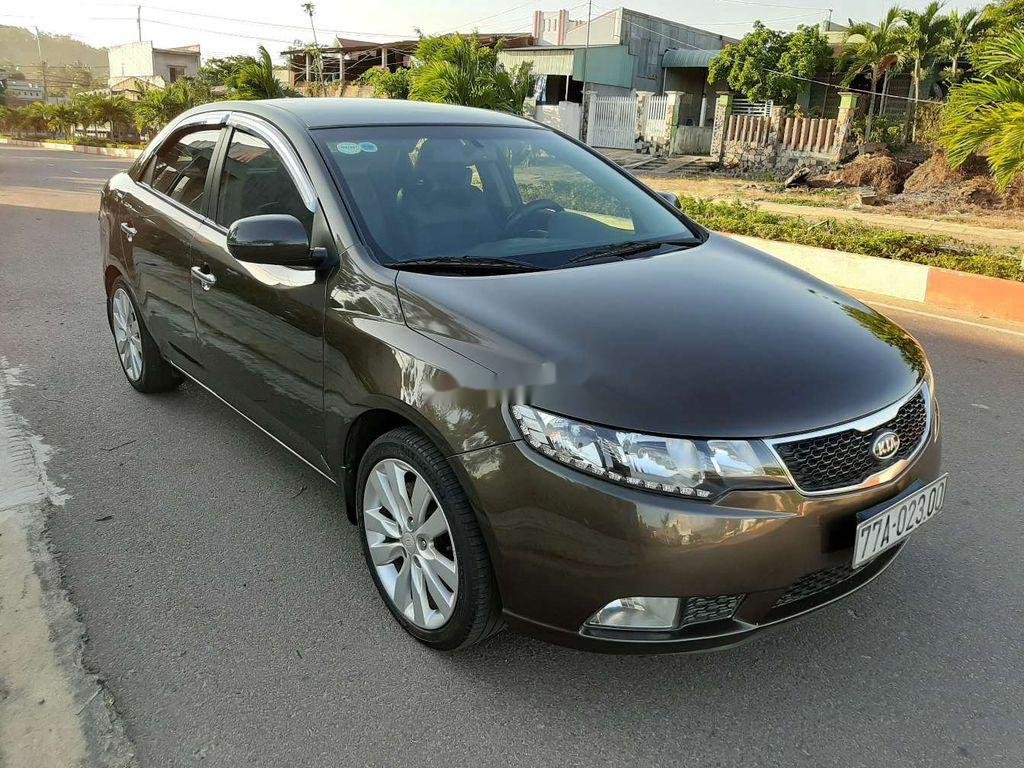 Kia Forte   2013 - Cần bán lại xe Kia Forte đời 2013, màu nâu, giá chỉ 328 triệu