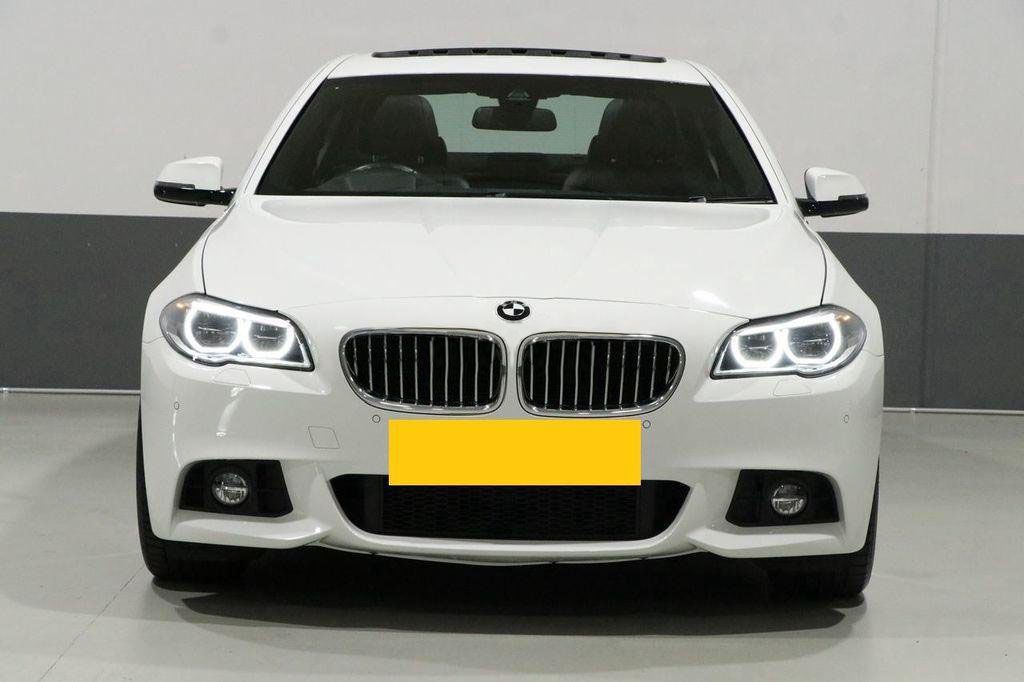 BMW 5 Series   2015 - Bán ô tô BMW 520i 2015, màu trắng, nhập khẩu, 900 triệu