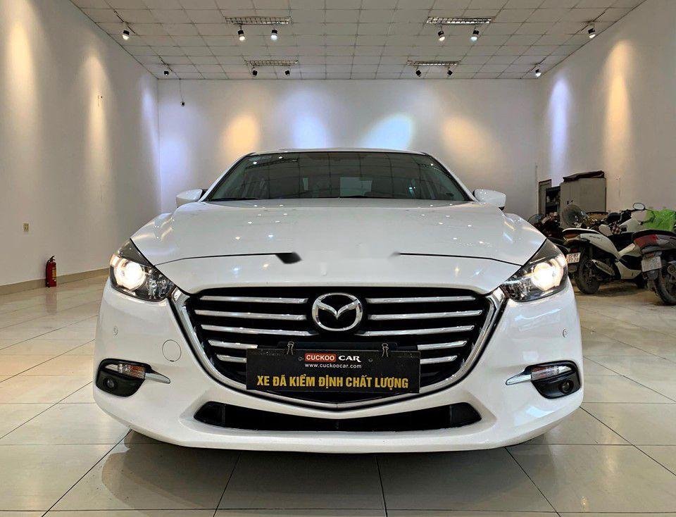 Mazda 3 2018 - Cần bán gấp Mazda 3 sản xuất năm 2018, màu trắng, 630 triệu