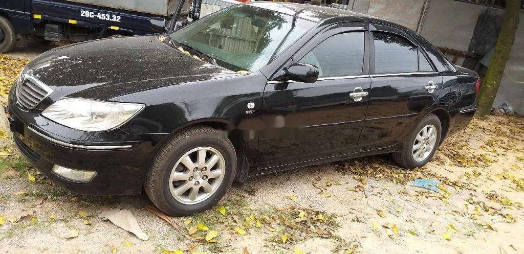 Toyota Corona 2003 - Cần bán lại xe Toyota Corona năm sản xuất 2003, màu đen, nhập khẩu