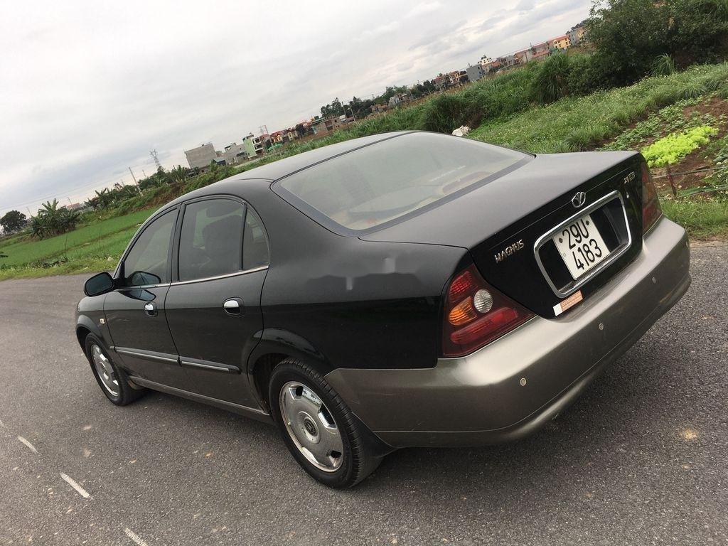 Daewoo Magnus 2004 - Cần bán xe Daewoo Magnus đời 2004, màu đen giá cạnh tranh