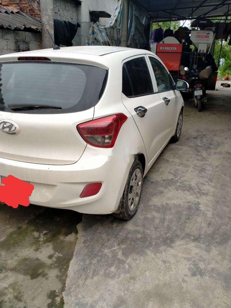 Hyundai Grand i10 2014 - Cần bán gấp Hyundai Grand i10 năm 2014, màu trắng, nhập khẩu, giá chỉ 217 triệu