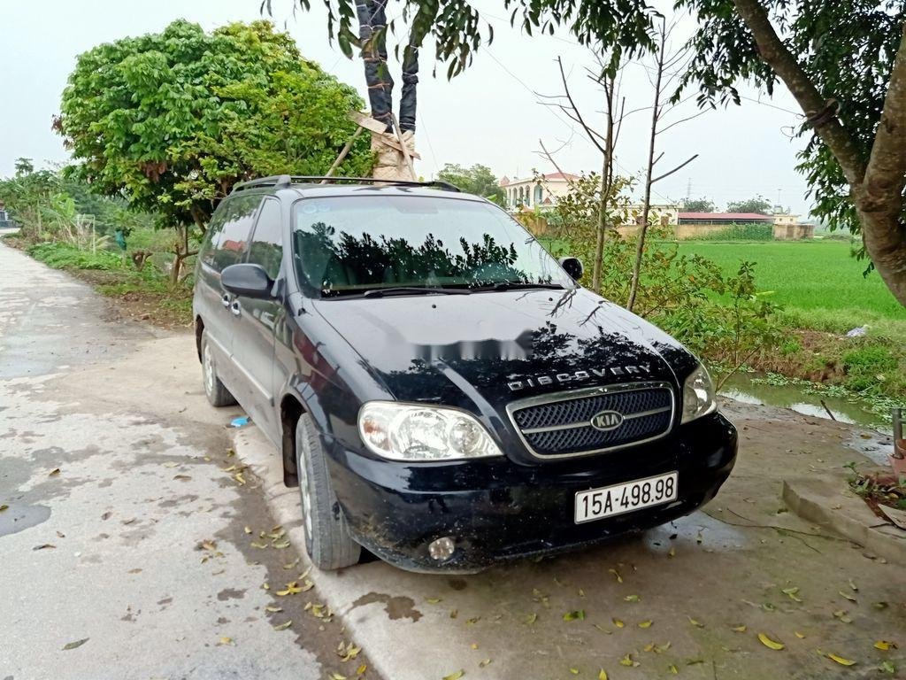 Kia Carnival 2009 - Cần bán gấp Kia Carnival năm 2009, màu đen, nhập khẩu nguyên chiếc giá cạnh tranh