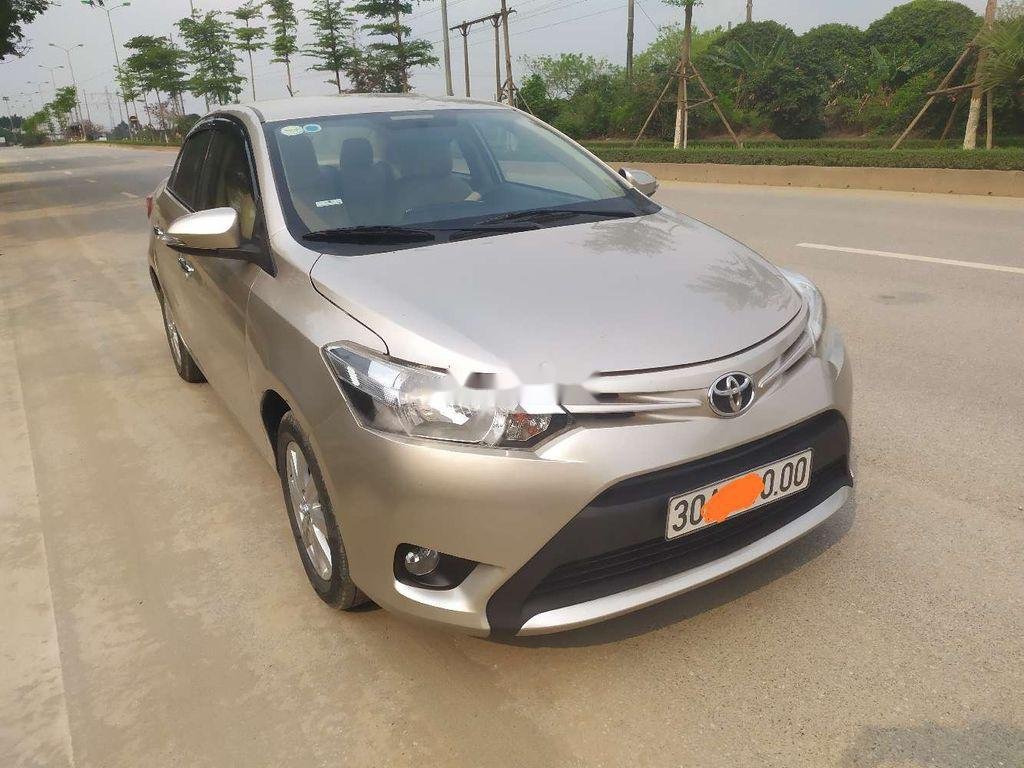Toyota Vios 2014 - Cần bán xe Toyota Vios đời 2014, màu vàng cát, giá tốt