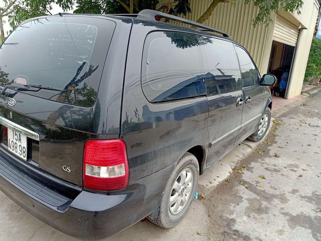 Kia Carnival 2009 - Cần bán gấp Kia Carnival năm 2009, màu đen, nhập khẩu nguyên chiếc giá cạnh tranh