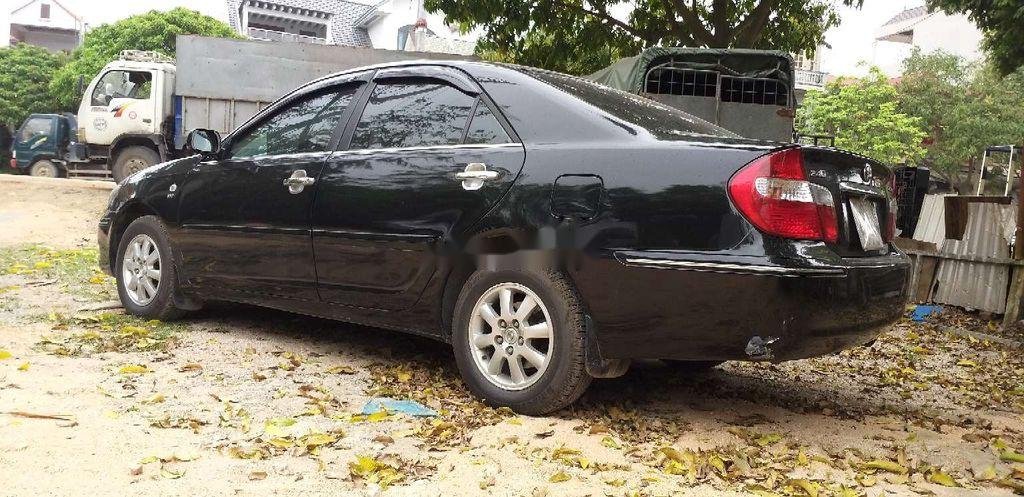 Toyota Corona 2003 - Cần bán lại xe Toyota Corona năm sản xuất 2003, màu đen, nhập khẩu