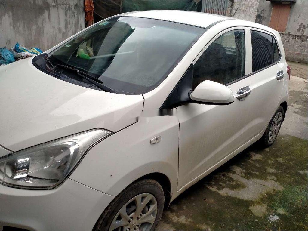 Hyundai Grand i10 2014 - Cần bán gấp Hyundai Grand i10 năm 2014, màu trắng, nhập khẩu, giá chỉ 217 triệu