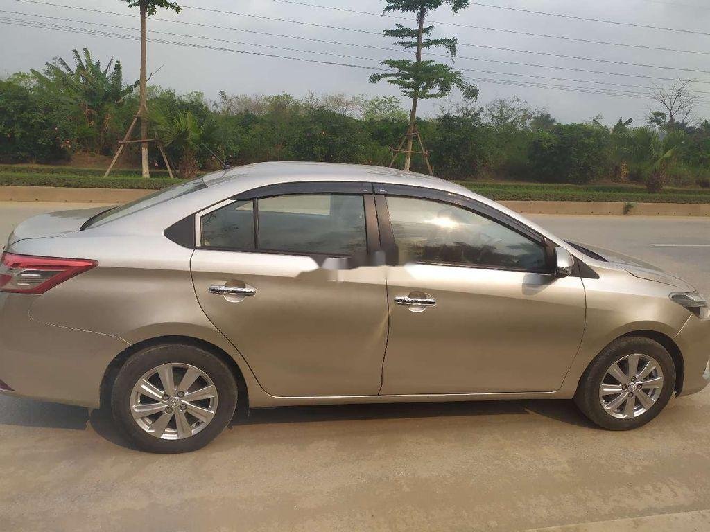 Toyota Vios 2014 - Cần bán xe Toyota Vios đời 2014, màu vàng cát, giá tốt