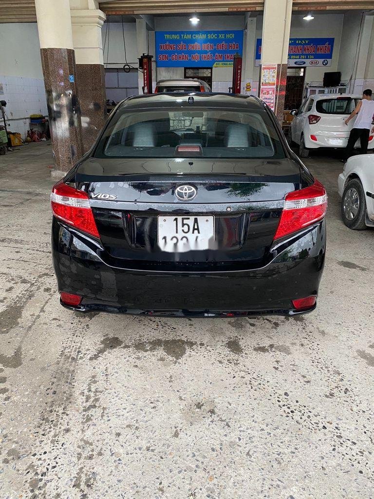 Toyota Vios 2014 - Bán Toyota Vios năm 2014, màu đen, 325tr