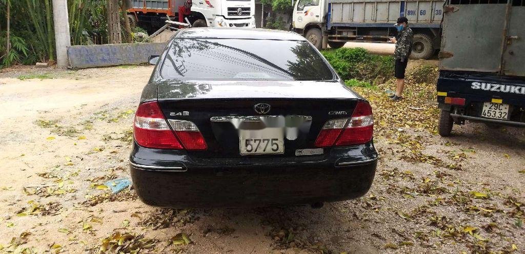 Toyota Corona 2003 - Cần bán lại xe Toyota Corona năm sản xuất 2003, màu đen, nhập khẩu