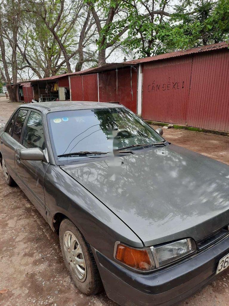 Mazda 323   1994 - Bán xe cũ Mazda 323 năm 1994, màu xám