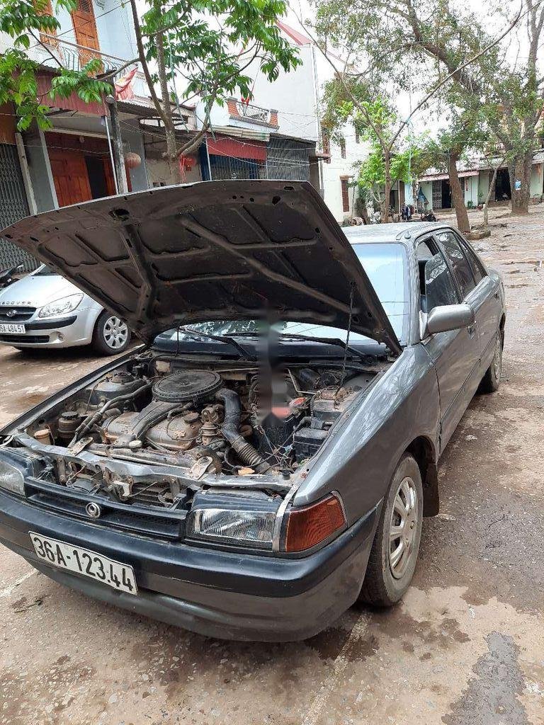 Mazda 323   1994 - Bán xe cũ Mazda 323 năm 1994, màu xám