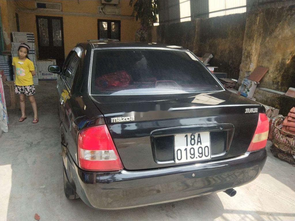 Mazda 323   2002 - Bán xe Mazda 323 năm 2002, màu đen, nhập khẩu  