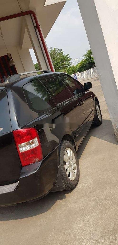 Kia Carnival 2009 - Bán Kia Carnival năm sản xuất 2009, màu đen, nhập khẩu