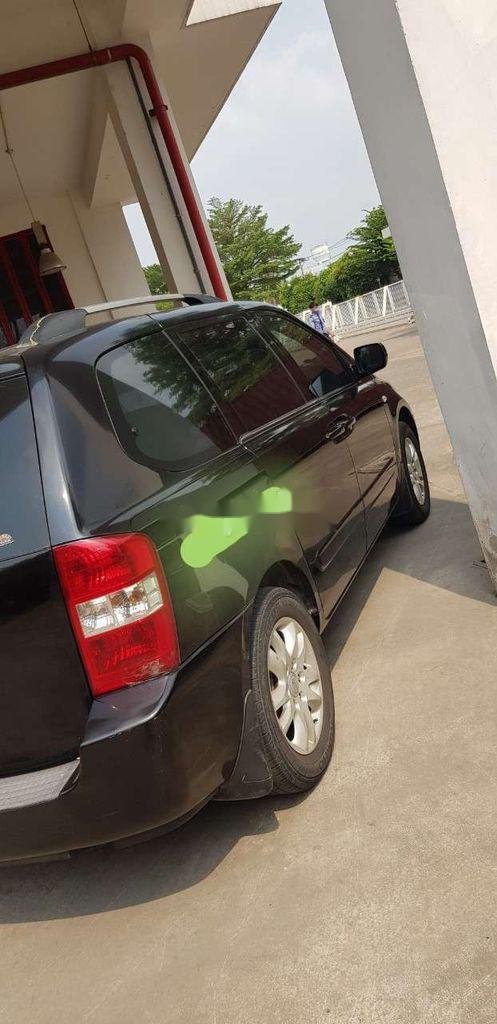 Kia Carnival 2009 - Bán Kia Carnival năm sản xuất 2009, màu đen, nhập khẩu