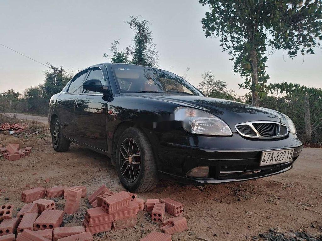 Daewoo Nubira   2003 - Bán xe cũ Daewoo Nubira sản xuất năm 2003, màu đen