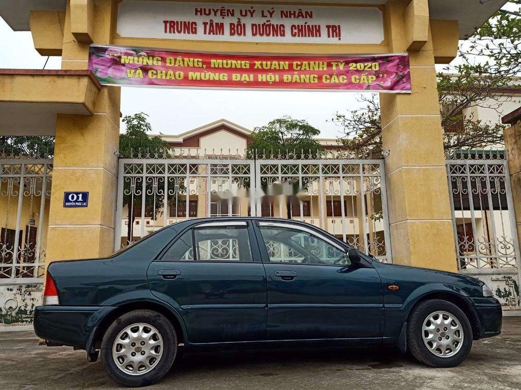 Ford Laser    2001 - Cần bán Ford Laser sản xuất 2001, xe nhập, giá chỉ 125 triệu