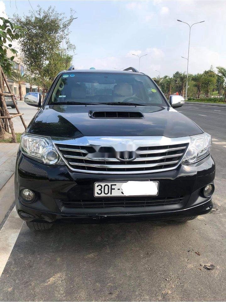 Toyota Fortuner 2014 - Bán xe Toyota Fortuner năm 2014, màu đen, 705tr