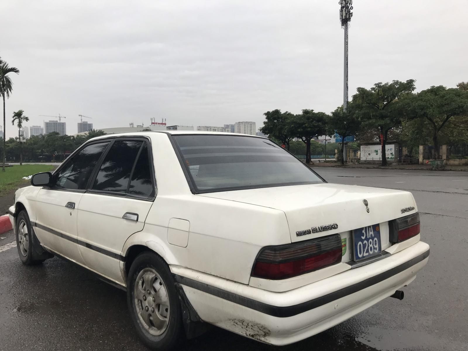 Nissan Bluebird 1996 - Cần bán xe Nissan Bluebird đời 1996, màu trắng, xe biển xanh