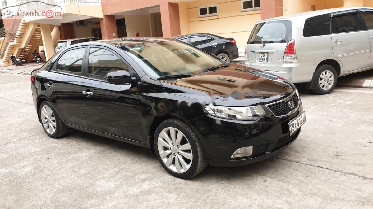 Kia Cerato 2011 - Cần bán lại xe Kia Cerato 1.6 AT đời 2011, màu đen, xe nhập