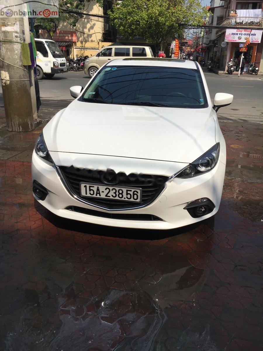 Mazda 3 1.5 AT 2016 - Cần bán Mazda 3 1.5 AT đời 2016, màu trắng đã đi 29000 km