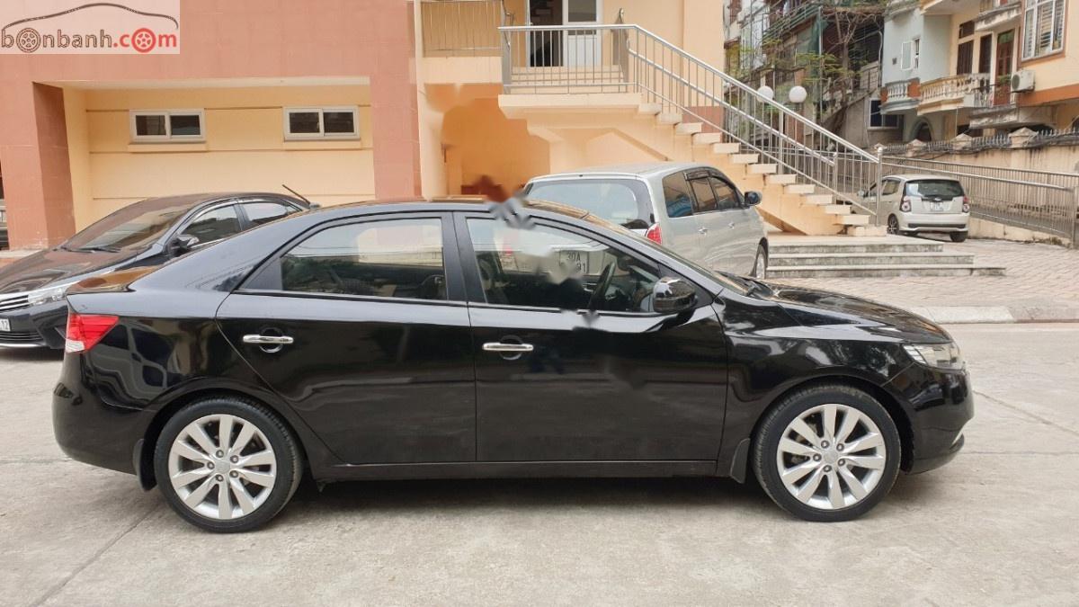 Kia Cerato 2011 - Cần bán lại xe Kia Cerato 1.6 AT đời 2011, màu đen, xe nhập